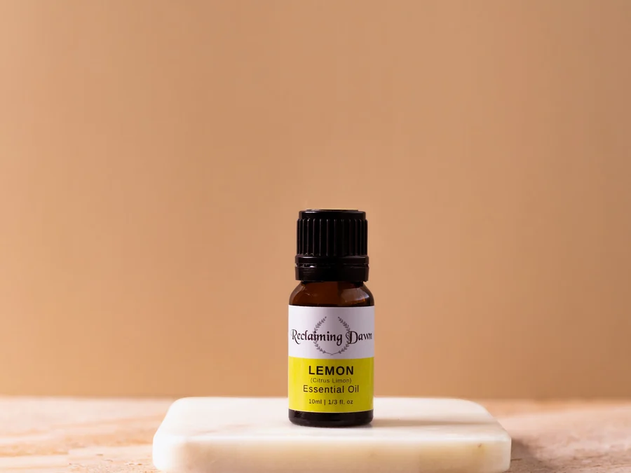Reclaiming Dawn lemon essential oil bottle