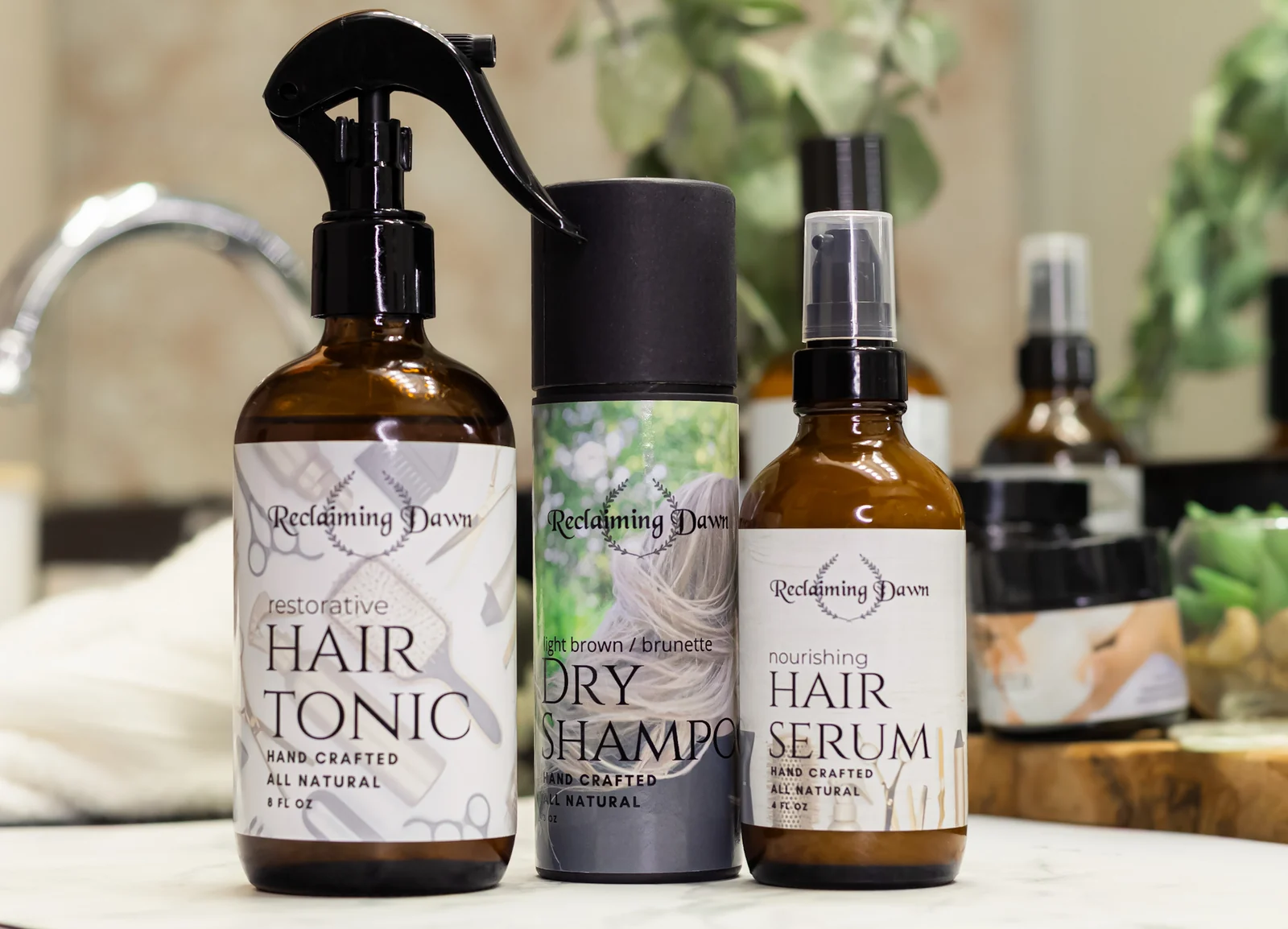 Reclaiming Dawn hair tonic, dry shampoo and hair serum in a bright bathroom