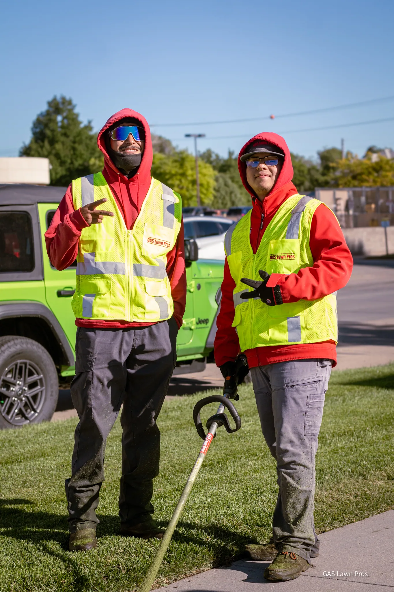 Two GAS Lawn Pros employees on a job site